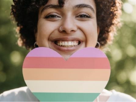 woman smiling with heart